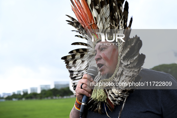 Indigenous leaders hold an act in Brasilia, Brazil, on October 30, 2024, to protest against PEC48, which defines a time frame for demarcatin...