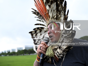 Indigenous leaders hold an act in Brasilia, Brazil, on October 30, 2024, to protest against PEC48, which defines a time frame for demarcatin...