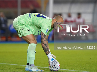 Simone Perilli of Hellas Verona is in action during the Serie A match between Lecce and Verona in Lecce, Italy, on October 29, 2024. (