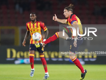 Federico Baschirotto of US Lecce is in action during the Serie A match between Lecce and Verona in Lecce, Italy, on October 29, 2024. (