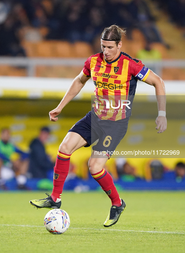 Federico Baschirotto of US Lecce is in action during the Serie A match between Lecce and Verona in Lecce, Italy, on October 29, 2024. 