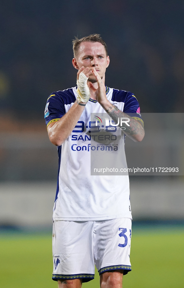 Players of Hellas Verona applaud the fans following the final whistle during the Serie A match between Lecce and Verona in Lecce, Italy, on...