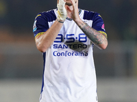 Players of Hellas Verona applaud the fans following the final whistle during the Serie A match between Lecce and Verona in Lecce, Italy, on...