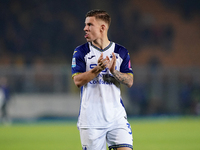 Players of Hellas Verona applaud the fans following the final whistle during the Serie A match between Lecce and Verona in Lecce, Italy, on...