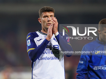 Players of Hellas Verona applaud the fans following the final whistle during the Serie A match between Lecce and Verona in Lecce, Italy, on...