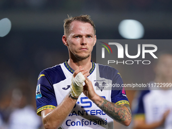 Players of Hellas Verona applaud the fans following the final whistle during the Serie A match between Lecce and Verona in Lecce, Italy, on...