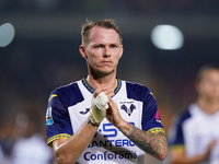 Players of Hellas Verona applaud the fans following the final whistle during the Serie A match between Lecce and Verona in Lecce, Italy, on...