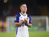 Players of Hellas Verona applaud the fans following the final whistle during the Serie A match between Lecce and Verona in Lecce, Italy, on...