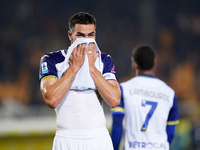 Players of Hellas Verona applaud the fans following the final whistle during the Serie A match between Lecce and Verona in Lecce, Italy, on...