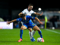 Lorenzo Colombo of Empoli FC and Stefan de Vrij of FC Internazionale compete for the ball during the Serie A Enilive match between Empoli FC...