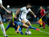 Lorenzo Colombo of Empoli FC and Stefan de Vrij of FC Internazionale compete for the ball during the Serie A Enilive match between Empoli FC...