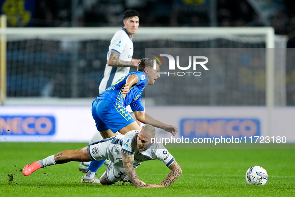 Jacopo Fazzini of Empoli FC and Federico Dimarco of FC Internazionale compete for the ball during the Serie A Enilive match between Empoli F...