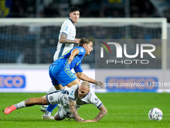 Jacopo Fazzini of Empoli FC and Federico Dimarco of FC Internazionale compete for the ball during the Serie A Enilive match between Empoli F...