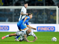 Jacopo Fazzini of Empoli FC and Federico Dimarco of FC Internazionale compete for the ball during the Serie A Enilive match between Empoli F...