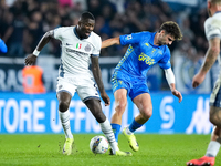 Saba Goglichidze of Empoli FC commits the red card foul on Marcus Thuram of FC Internazionale during the Serie A Enilive match between Empol...