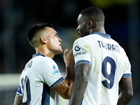 Lautaro Martinez of FC Internazionale talks to Marcus Thuram of FC Internazionale during the Serie A Enilive match between Empoli FC and FC...