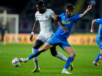 Mattia Viti of Empoli FC and Marcus Thuram of FC Internazionale compete for the ball during the Serie A Enilive match between Empoli FC and...