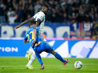 Marcus Thuram of FC Internazionale and Mattia De Sciglio of Empoli FC compete for the ball during the Serie A Enilive match between Empoli F...