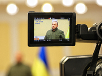 In Odesa, Ukraine, on October 30, 2024, the Minister of Defence of Ukraine, Rustem Umerov, appears on the camera monitor during a joint brie...