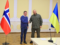 In Odesa, Ukraine, on October 30, 2024, the Minister of Defence of Ukraine, Rustem Umerov, shakes hands with the Minister of Defence of the...