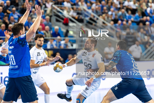 Luka Cindric  and Leon Susnja are playing during the match EHF Champions League Men match between  Orlen Wisla Plock and Veszprem HC in Ploc...