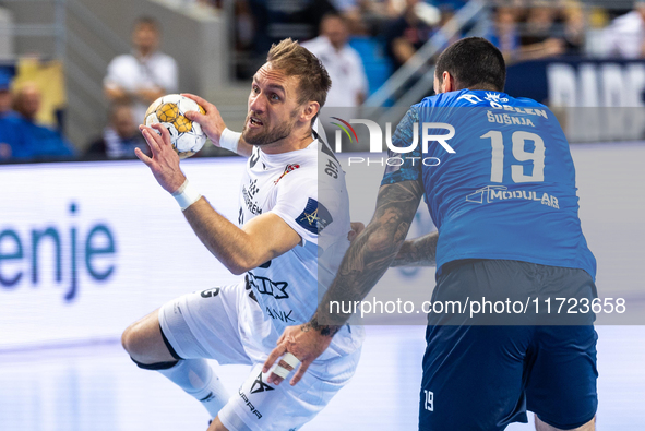 Luka Cindric and Leon Susnja  are playing during the match EHF Champions League Men match between  Orlen Wisla Plock and Veszprem HC in Ploc...