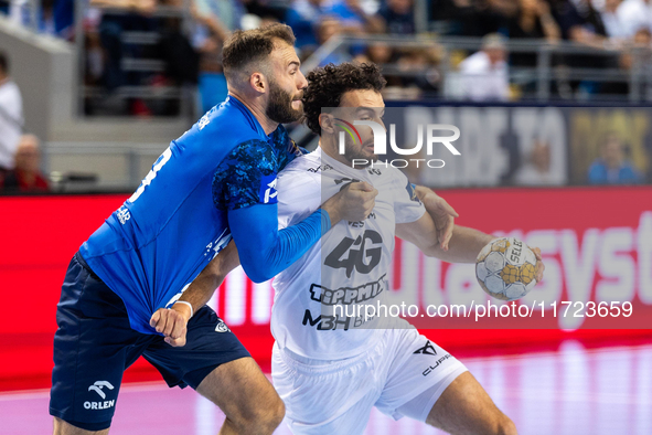  Zoltan Szita and Nedim Remili are playing during the match EHF Champions League Men match between  Orlen Wisla Plock and Veszprem HC in Plo...