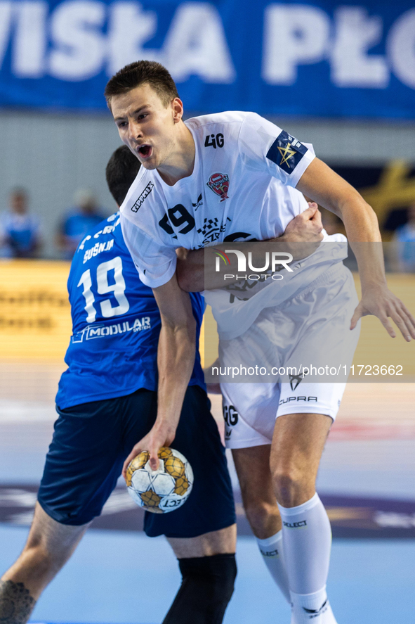 Sergei Mark Kosorotov  is playing during the match EHF Champions League Men match between  Orlen Wisla Plock and Veszprem HC in Plock, Polan...