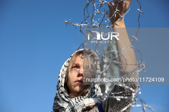 Participants in a protest against the suspension of asylum law under the slogan 'Fuck your borders' gather at the Main Square in Krakow, Pol...