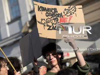 Participants in a protest against the suspension of asylum law under the slogan 'Fuck your borders' gather at the Main Square in Krakow, Pol...