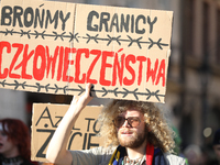 Participants of the protest against the suspension of asylum law under the slogan 'Fuck your borders' walk through the streets of the city i...