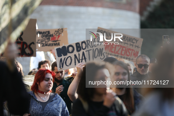 Participants of the protest against the suspension of asylum law under the slogan 'Fuck your borders' walk through the streets of the city i...