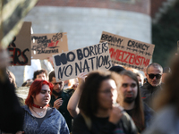 Participants of the protest against the suspension of asylum law under the slogan 'Fuck your borders' walk through the streets of the city i...