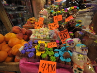 Sugar skulls, known as calaverita de azucar, are seen at a stand inside a market in the municipality of San Juan del Rio. Local market vendo...