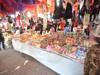 Sugar skulls, known as calaverita de azucar, are seen at a stand inside a market in the municipality of San Juan del Rio. Local market vendo...