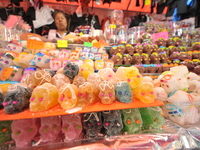 Sugar skulls, known as calaverita de azucar, are seen at a stand inside a market in the municipality of San Juan del Rio. Local market vendo...