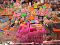 Sugar skulls, known as calaverita de azucar, are seen at a stand inside a market in the municipality of San Juan del Rio. Local market vendo...