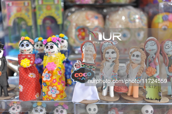 Sugar skulls, known as calaverita de azucar, are seen at a stand inside a market in the municipality of San Juan del Rio. Local market vendo...