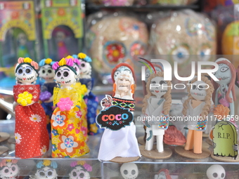 Sugar skulls, known as calaverita de azucar, are seen at a stand inside a market in the municipality of San Juan del Rio. Local market vendo...