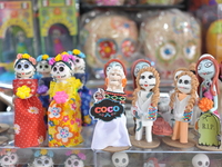 Sugar skulls, known as calaverita de azucar, are seen at a stand inside a market in the municipality of San Juan del Rio. Local market vendo...