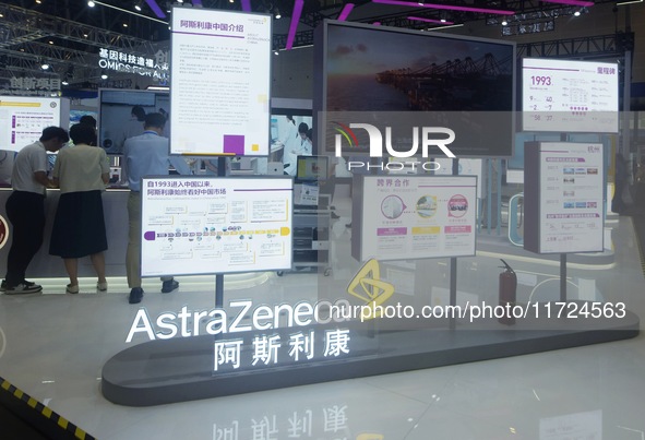 Visitors visit the stand of AstraZeneca in Hangzhou, China, on October 30, 2024. 