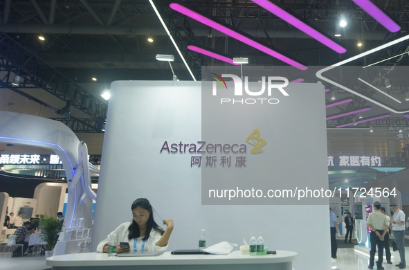 Visitors visit the stand of AstraZeneca in Hangzhou, China, on October 30, 2024. 