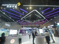 Visitors visit the stand of AstraZeneca in Hangzhou, China, on October 30, 2024. (