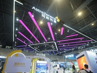 Visitors visit the stand of AstraZeneca in Hangzhou, China, on October 30, 2024. (