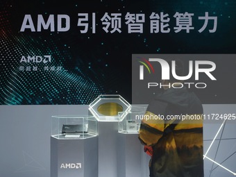 Visitors visit the booth of AMD at the 6th CIIE in Shanghai, China, on November 6, 2023. (