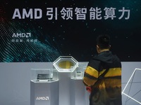 Visitors visit the booth of AMD at the 6th CIIE in Shanghai, China, on November 6, 2023. (