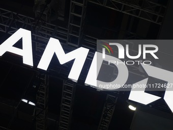 Visitors visit the booth of AMD at the 6th CIIE in Shanghai, China, on November 6, 2023. (