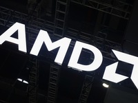 Visitors visit the booth of AMD at the 6th CIIE in Shanghai, China, on November 6, 2023. (