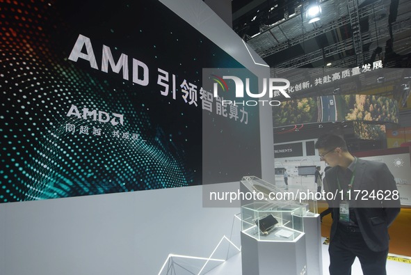 Visitors visit the booth of AMD at the 6th CIIE in Shanghai, China, on November 6, 2023. 