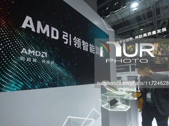 Visitors visit the booth of AMD at the 6th CIIE in Shanghai, China, on November 6, 2023. (